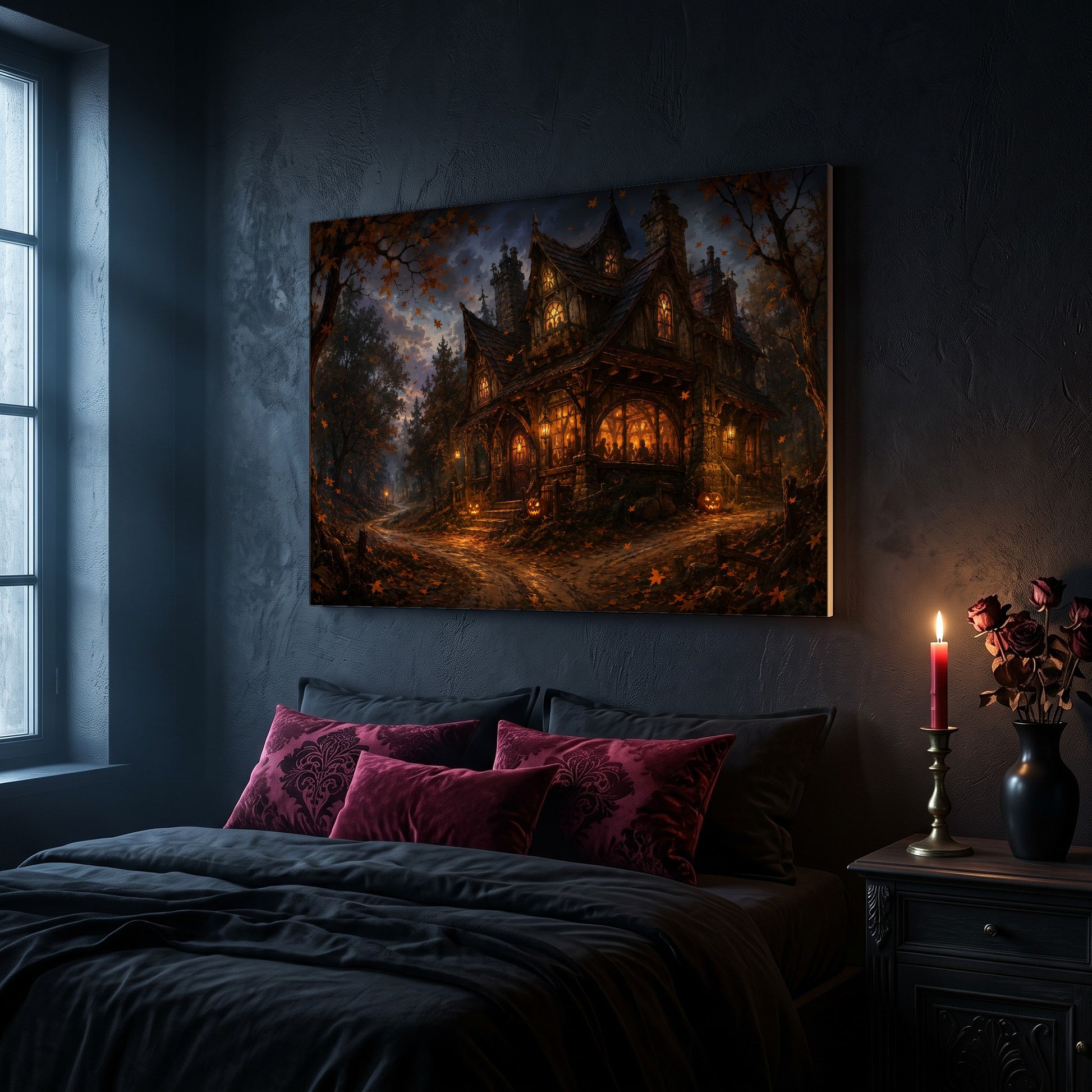 Lantern's End Inn tavern canvas hanging on a dark navy wall in a gothic bedroom, above a bed with burgundy velvet pillows and charcoal bedding, beside an arched leaded window and a wooden nightstand holding a lit red taper candle in a brass holder and a black vase of dried roses.