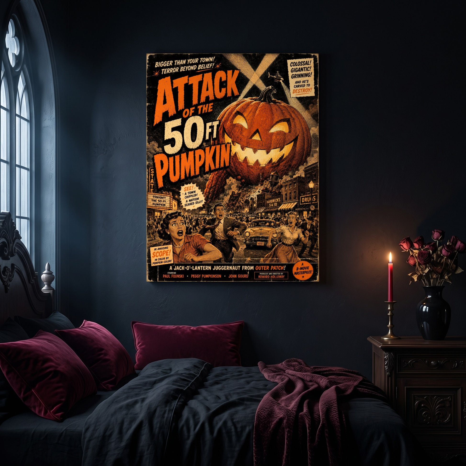 The Pumpkin That Ate Main Street canvas hanging on a dark navy wall in a gothic bedroom, above a bed with burgundy velvet pillows and charcoal bedding, beside an arched leaded window and a wooden nightstand holding a lit red taper candle in a brass holder and a black vase of dried roses.