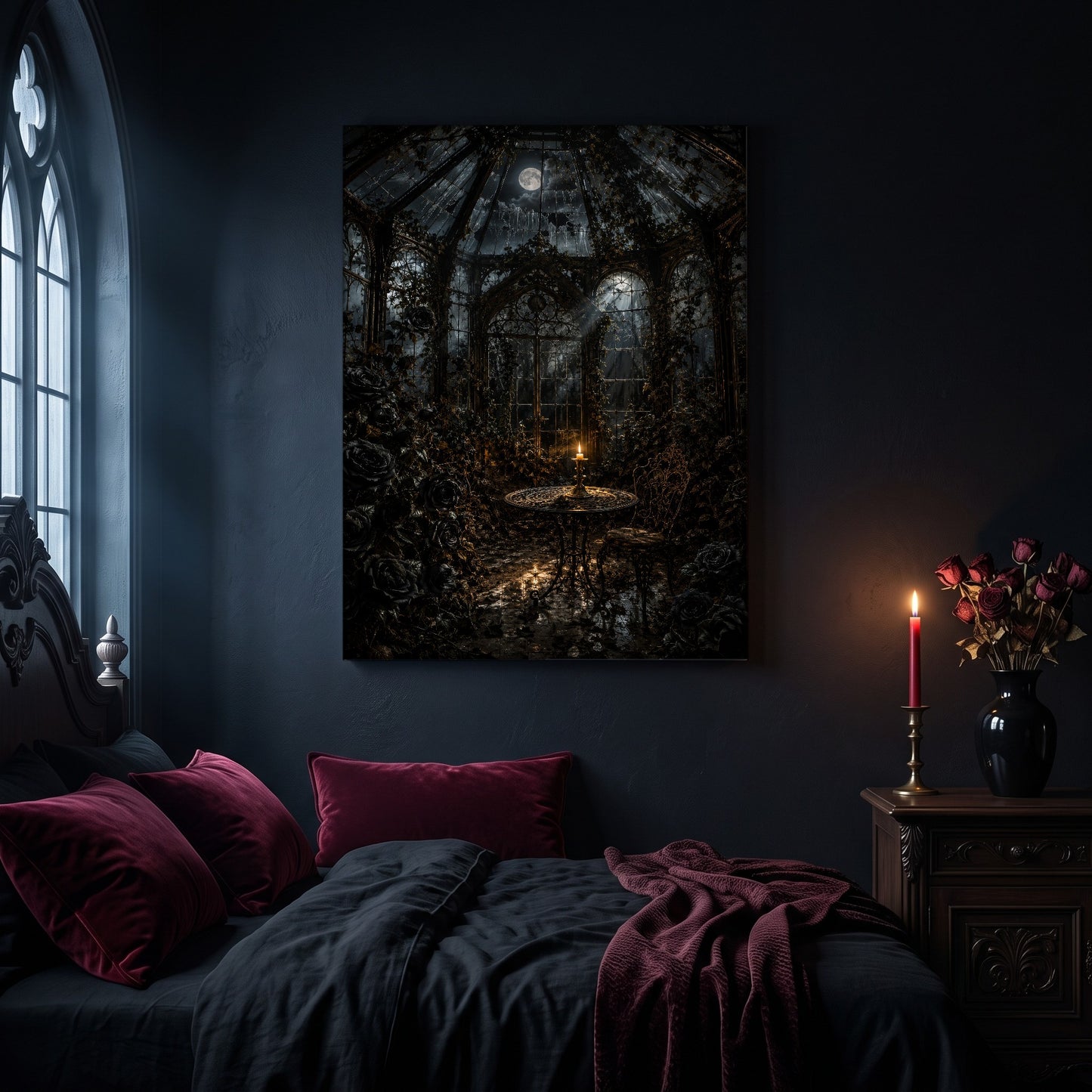 The Winter Garden conservatory canvas hanging on a dark navy wall in a gothic bedroom, above a bed with burgundy velvet pillows and charcoal bedding, beside an arched leaded window and a wooden nightstand holding a lit red taper candle in a brass holder and a black vase of dried roses.