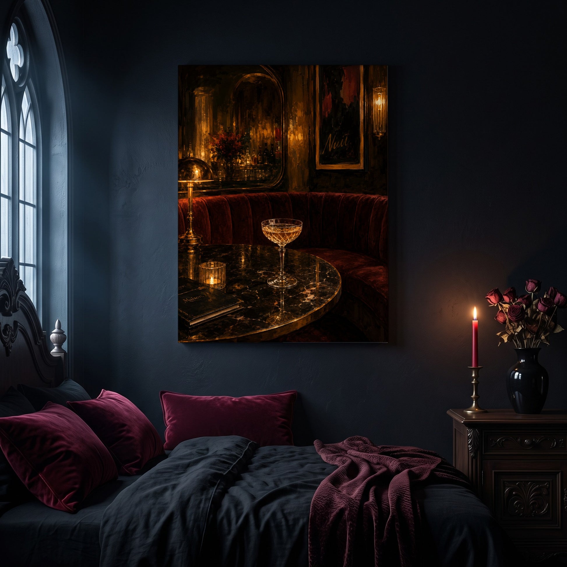Nuit speakeasy canvas hanging on a dark navy wall in a gothic bedroom, above a bed with burgundy velvet pillows and charcoal bedding, beside an arched leaded window and a wooden nightstand holding a lit red taper candle in a brass holder and a black vase of dried roses.