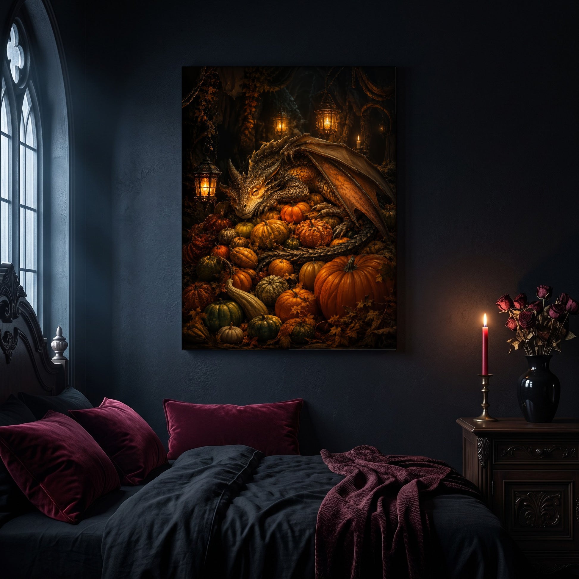 The Pumpkin Den canvas hanging on a dark navy wall in a gothic bedroom, above a bed with burgundy velvet pillows and charcoal bedding, beside an arched leaded window and a nightstand holding a lit red taper candle and a black vase of dried roses.