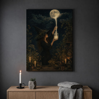 Moonfall night garden print hanging on a plain grey wall above a light oak sideboard, styled with a lit white taper candle in a black holder, a small stone pot of greenery and a folded grey throw.