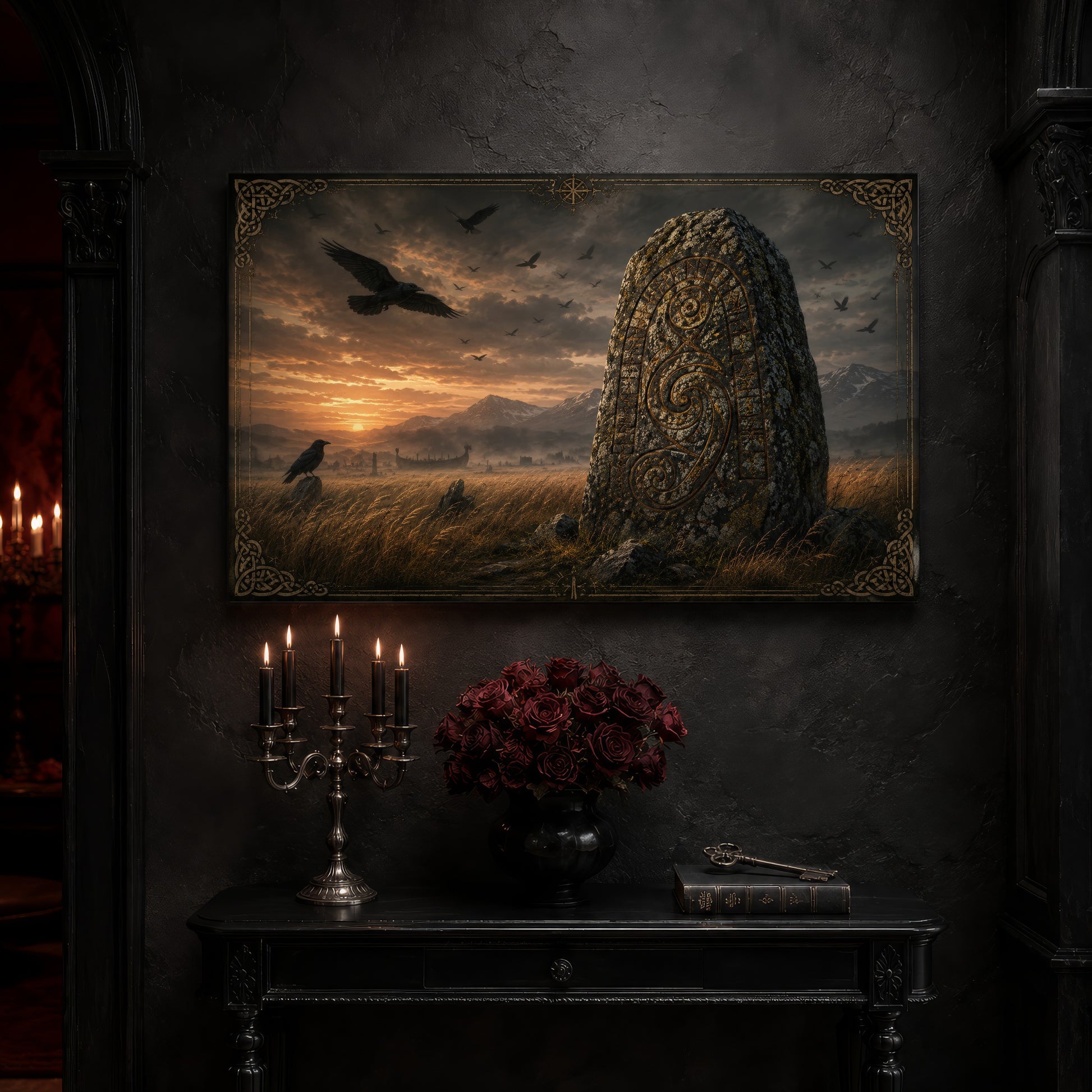 The Harvest Stone canvas on a near-black wall above a carved black console table, with a five-arm silver candelabra of lit black tapers, a black vase of deep red roses, and an antique key resting on a leather-bound book.