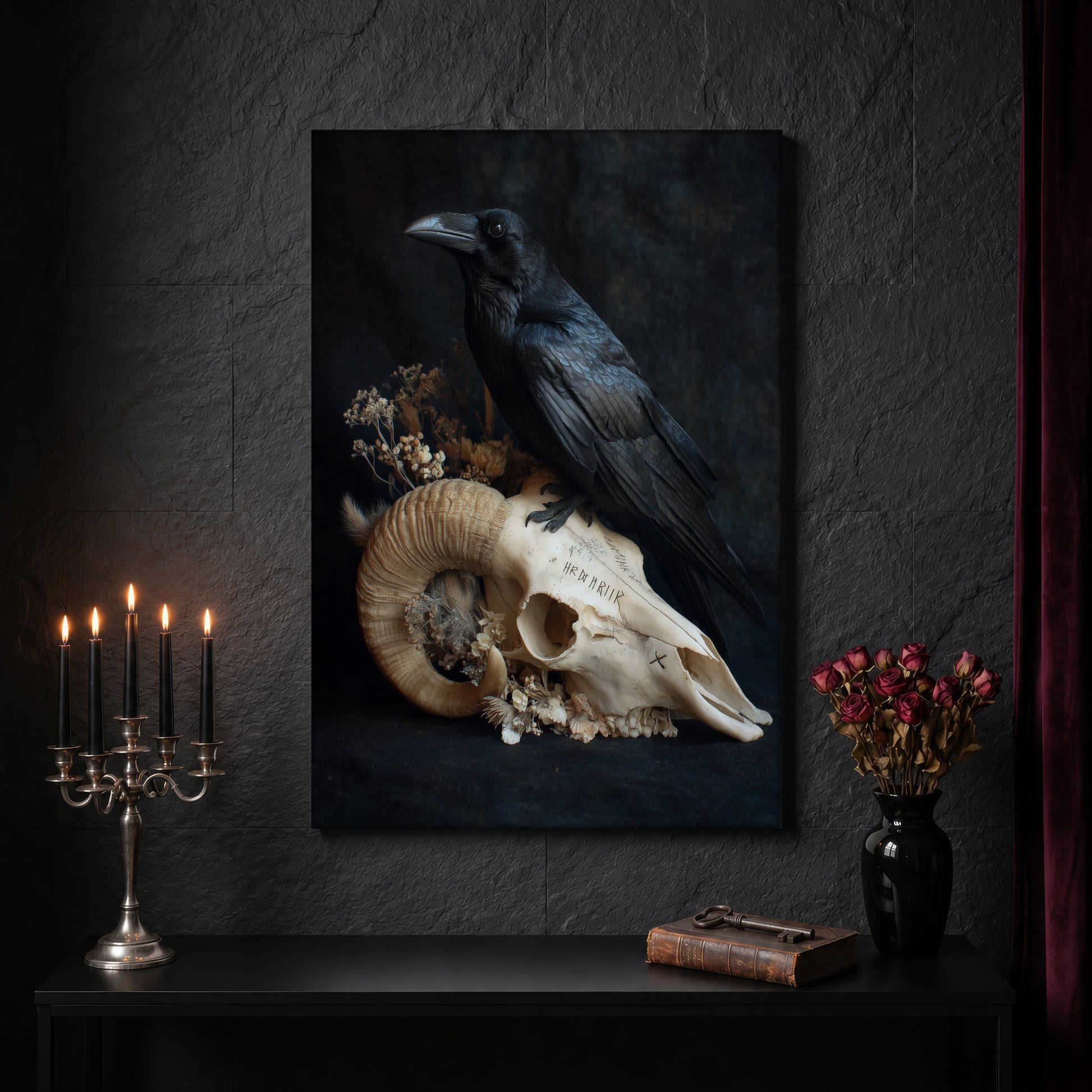 Hel raven canvas on a dark slate stone wall above a black console table, with a five-arm silver candelabra of lit black tapers, an antique iron key resting on a worn leather book, and a black vase of dried roses beside a burgundy velvet curtain.