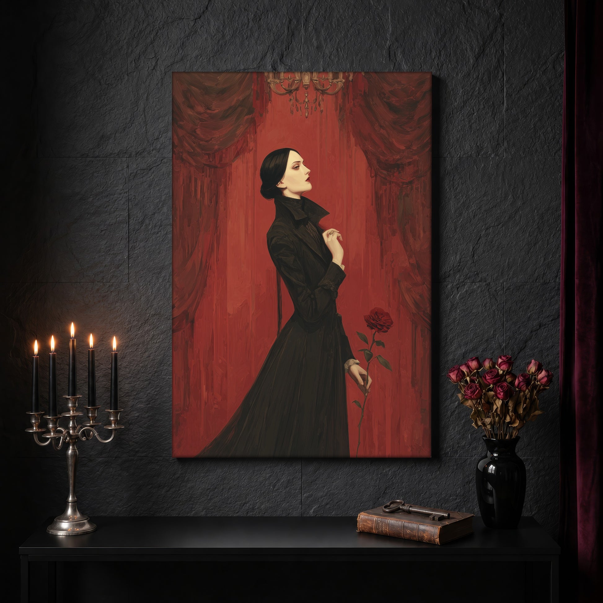 The Countess canvas on a dark slate stone wall above a black console table, with a five-arm silver candelabra of lit black tapers, an antique iron key resting on a worn leather book, and a black vase of dried roses beside a burgundy velvet curtain.