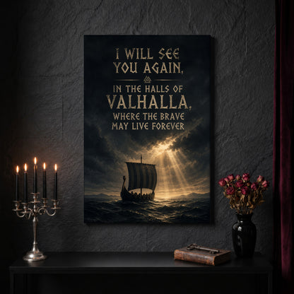 Valhalla Awaits canvas on a dark slate stone wall above a black console table, with a five-arm silver candelabra of lit black tapers, an antique iron key resting on a worn leather book, and a black vase of dried roses beside a burgundy velvet curtain.