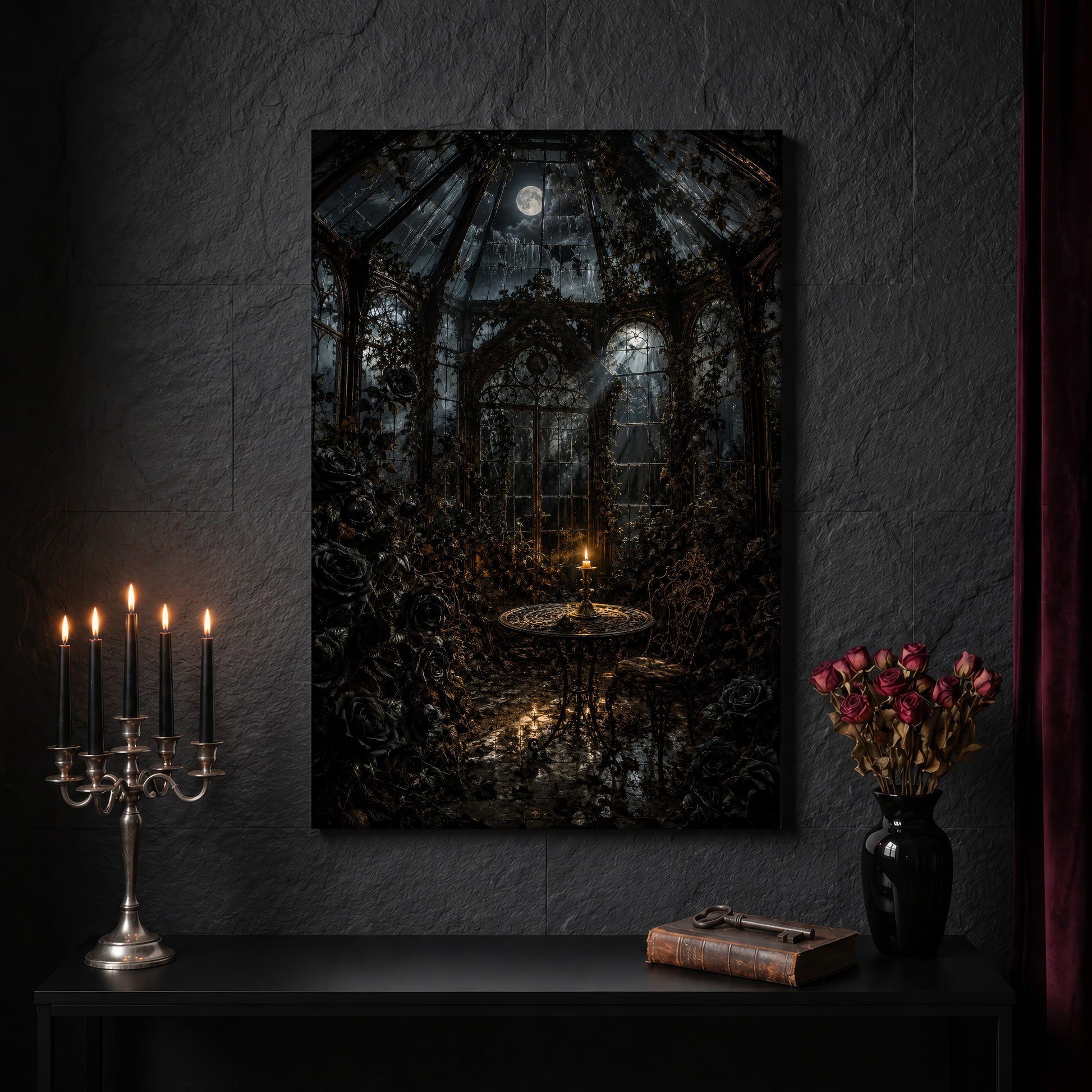 The Winter Garden glasshouse canvas on a dark slate stone wall above a black console table, with a five-arm silver candelabra of lit black tapers, an antique iron key resting on a worn leather book, and a black vase of dried roses beside a burgundy velvet curtain.