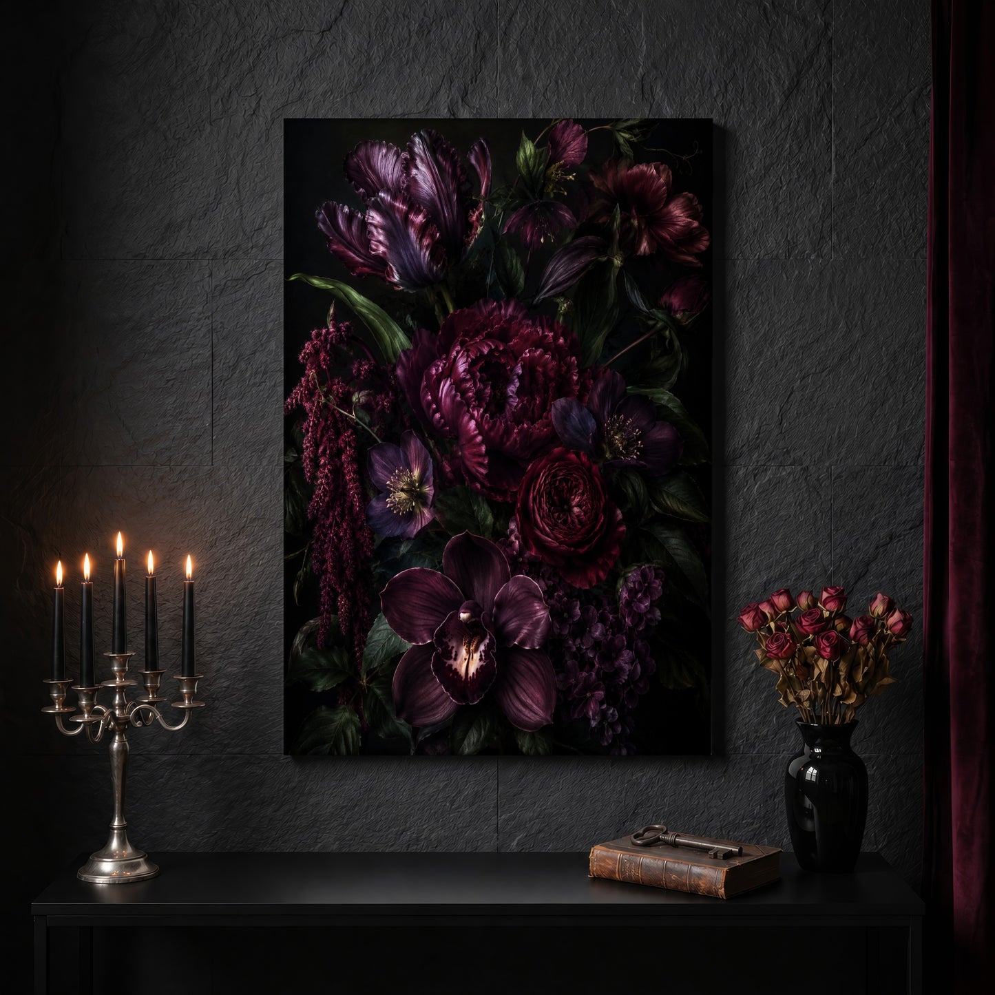 Umbra floral canvas on a dark slate stone wall above a black console table, with a five-arm silver candelabra of lit black tapers, an antique iron key resting on a worn leather book, and a black vase of dried roses beside a burgundy velvet curtain.