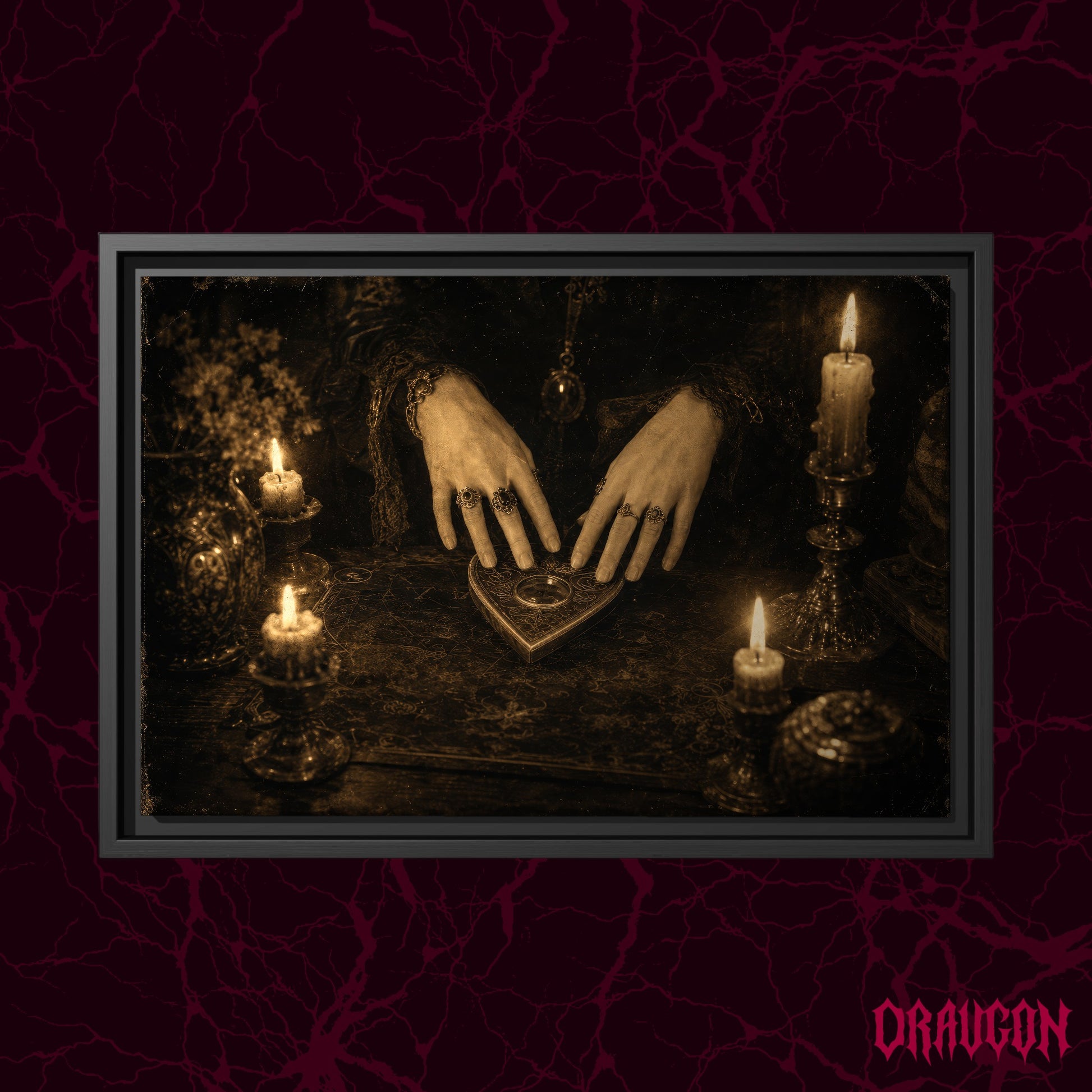 Midnight Communion shown as a black framed canvas hanging on a deep burgundy marbled background, displaying the ringed hands and heart-shaped planchette scene, with the red Draugon wordmark in the bottom right corner.