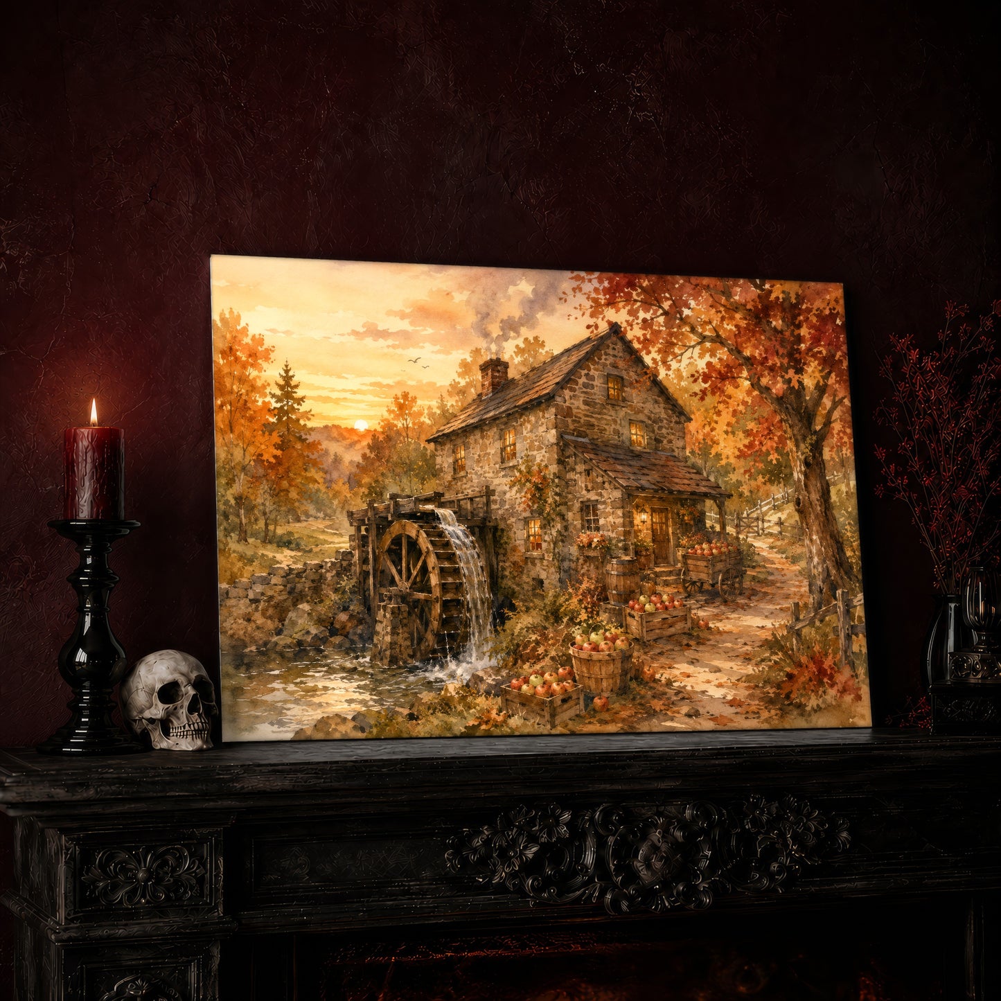 Millpond Gold canvas leaning on a dark carved mantel beside a lit dark red taper in a black candlestick, a bone-colored skull, and a small black vase of red berry sprigs, with a gilt-framed painting on the wall alongside.