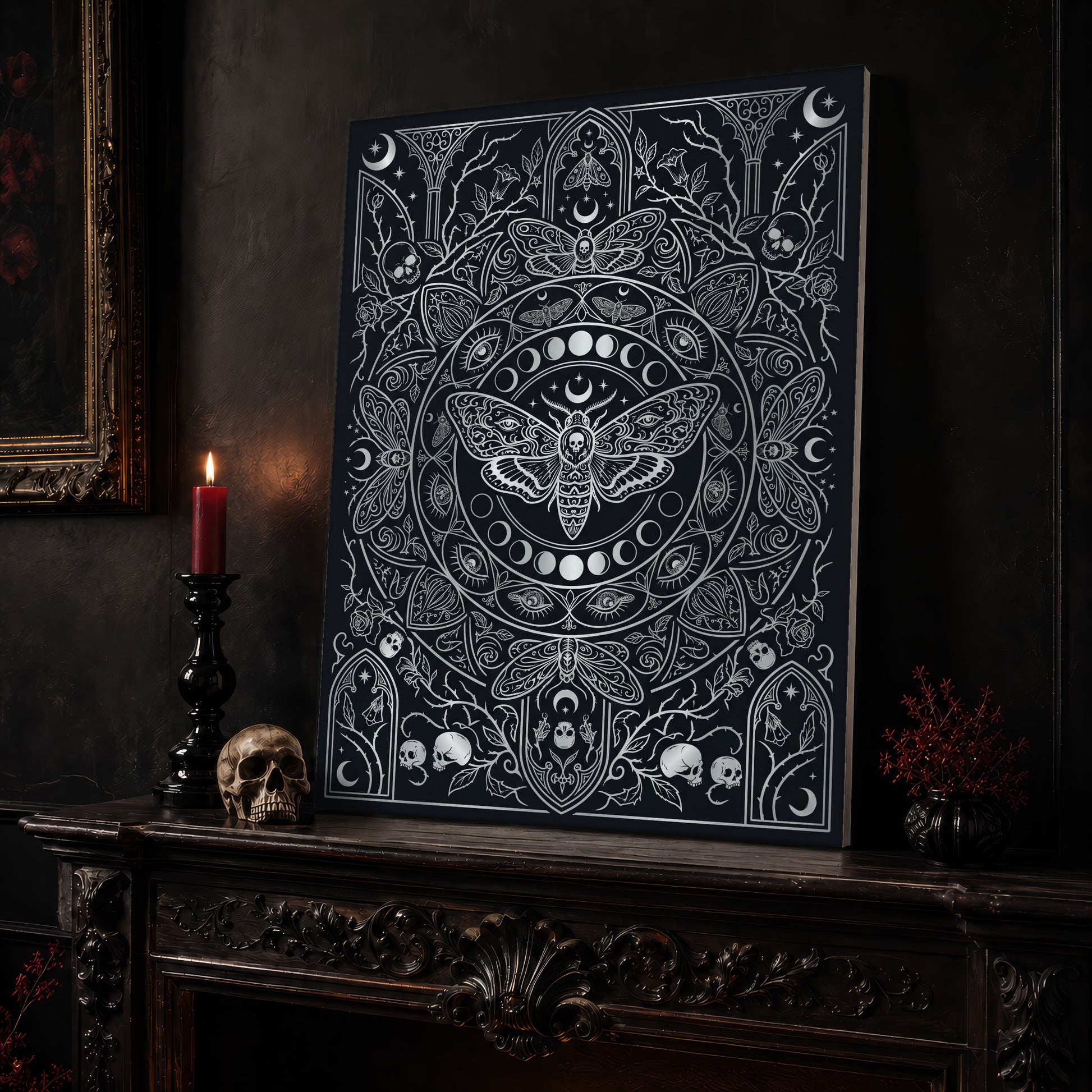 Vanitas death moth canvas leaning on a dark carved mantel beside a lit dark red taper in a black candlestick, a bone-coloured skull, and a small black vase of red berry sprigs, with a gilt-framed painting on the wall alongside.