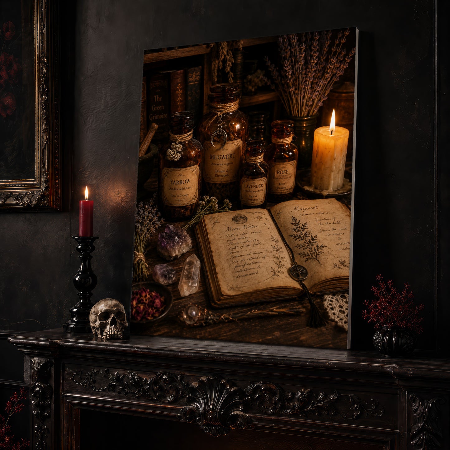 The Still Room apothecary canvas leaning on a dark carved mantel beside a lit dark red taper in a black candlestick, a bone-coloured skull, and a small black vase of red berry sprigs, with a gilt-framed painting on the wall alongside.