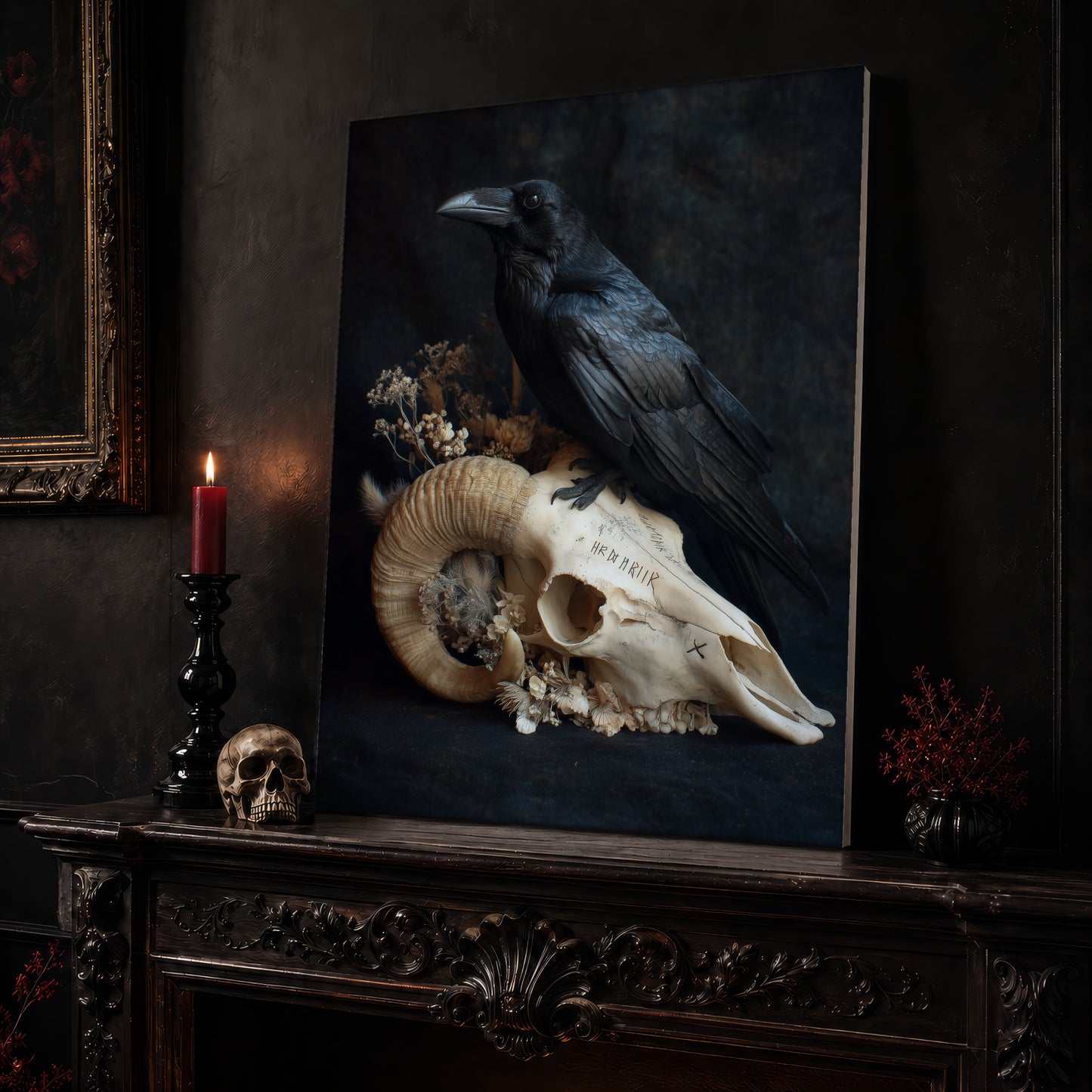 Hel still life canvas leaning on a dark carved mantel beside a lit dark red taper in a black candlestick, a bone-coloured skull, and a small black vase of red berry sprigs, with a gilt-framed painting on the wall alongside.