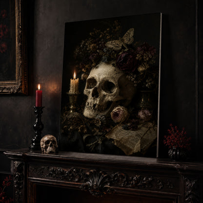 Requiem skull canvas leaning on a dark carved mantel beside a lit dark red taper in a black candlestick, a bone-coloured skull, and a small black vase of red berry sprigs, with a gilt-framed painting on the wall alongside.