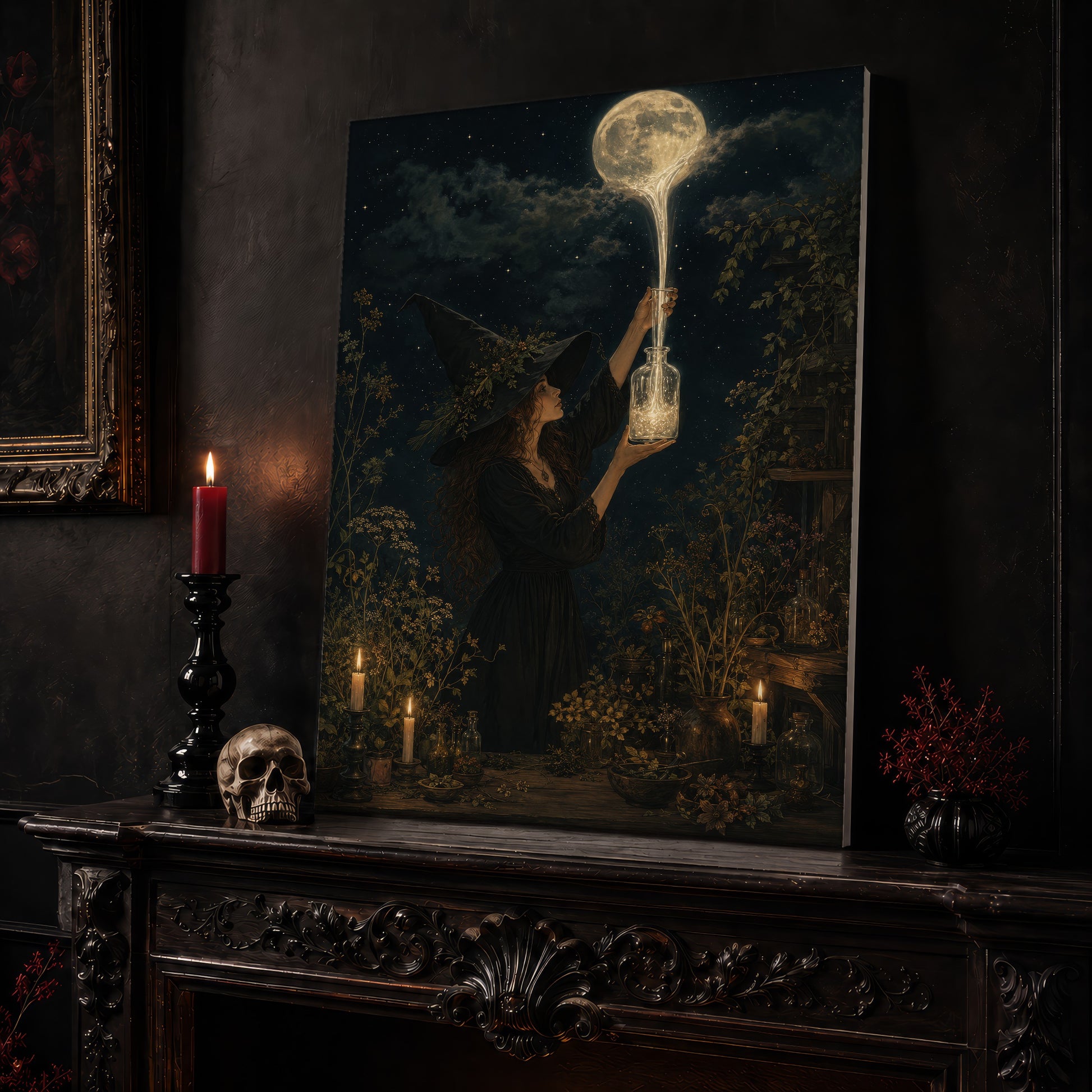 Moonfall lunar alchemy canvas leaning on a dark carved mantel beside a lit dark red taper in a black candlestick and a bone-coloured skull, with a gilt-framed painting on the wall alongside.