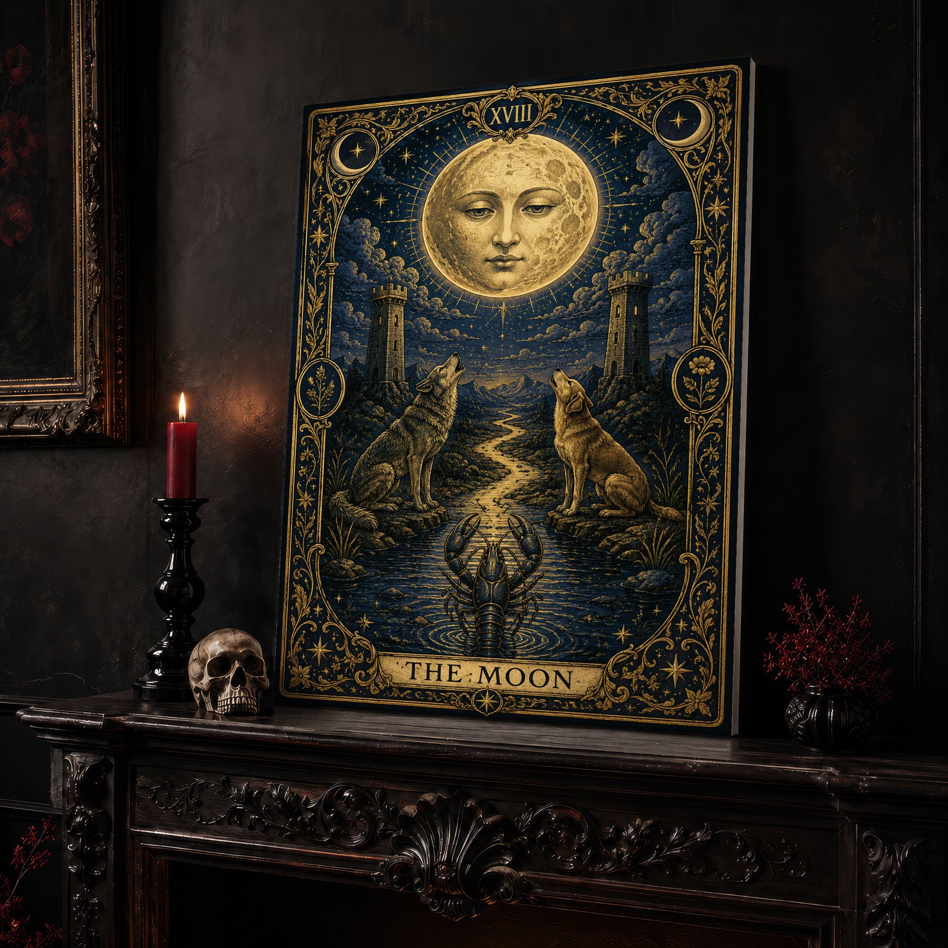 La Lune arcana canvas leaning on a dark carved mantel beside a lit dark red taper in a black candlestick, a bone-coloured skull, and a small black vase of red berry sprigs, with a gilt-framed painting on the wall alongside.