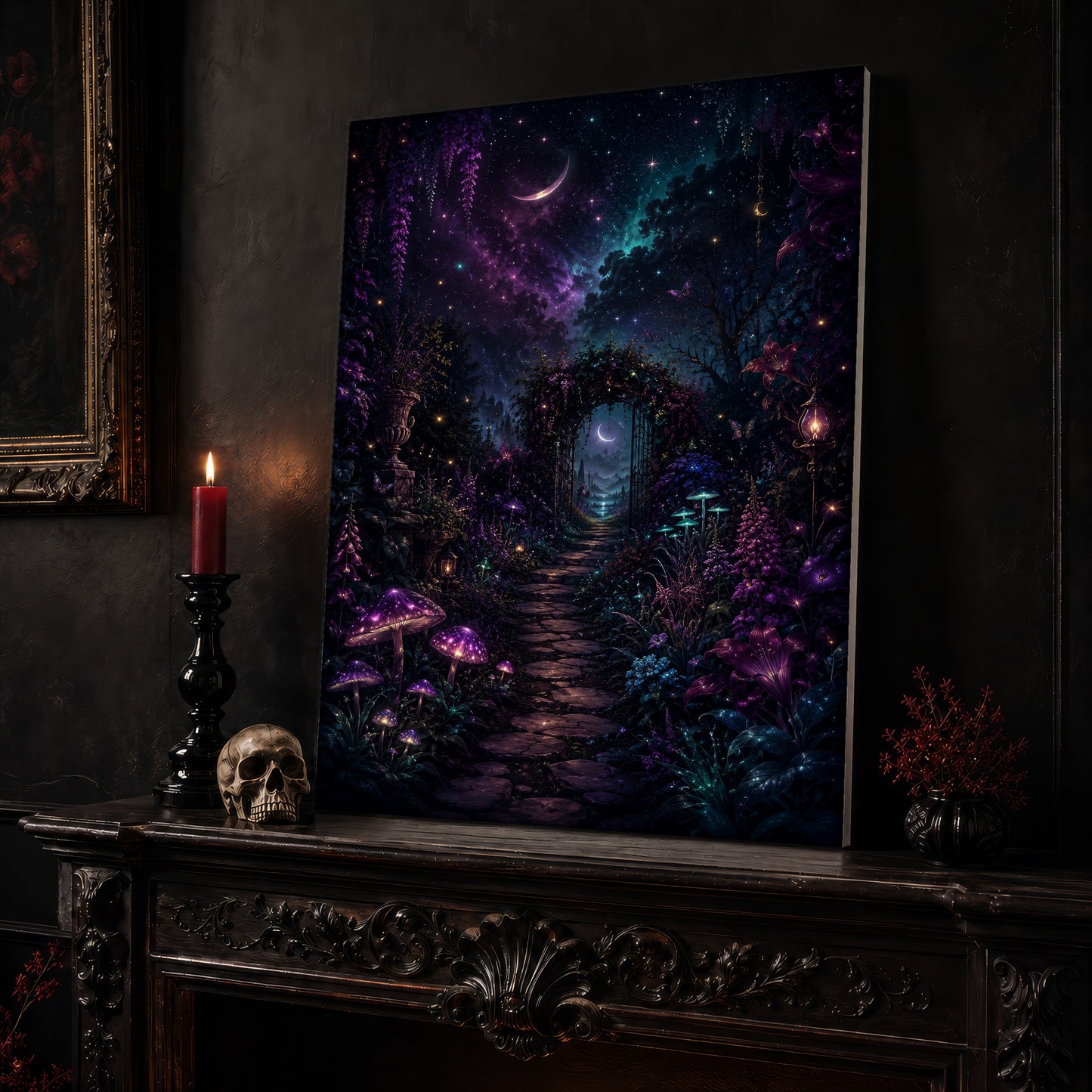 The Midnight Garden canvas leaning on a dark carved mantel beside a lit dark red taper in a black candlestick, a bone-coloured skull, and a small black vase of red berry sprigs, with a gilt-framed painting on the wall alongside.