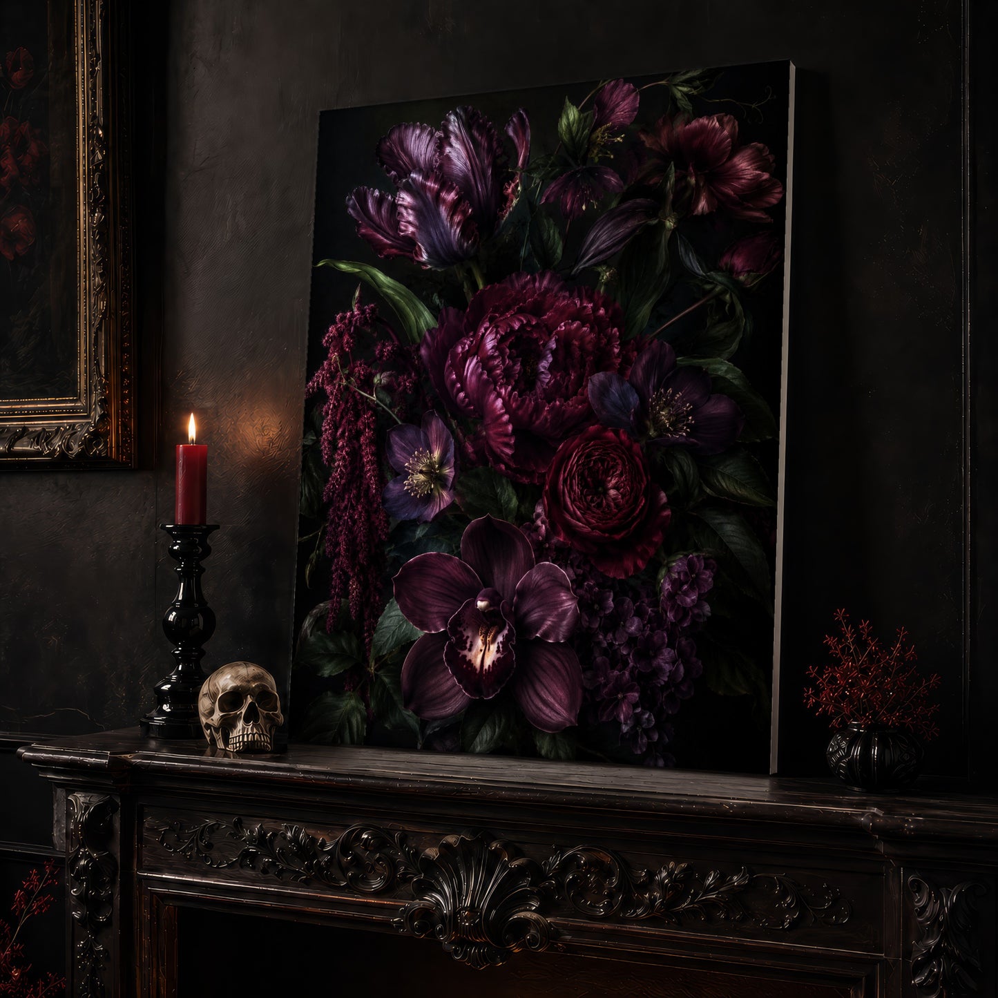 Umbra floral canvas leaning on a dark carved mantel beside a lit dark red taper in a black candlestick, a bone-coloured skull, and a small black vase of red berry sprigs, with a gilt-framed painting on the wall alongside.