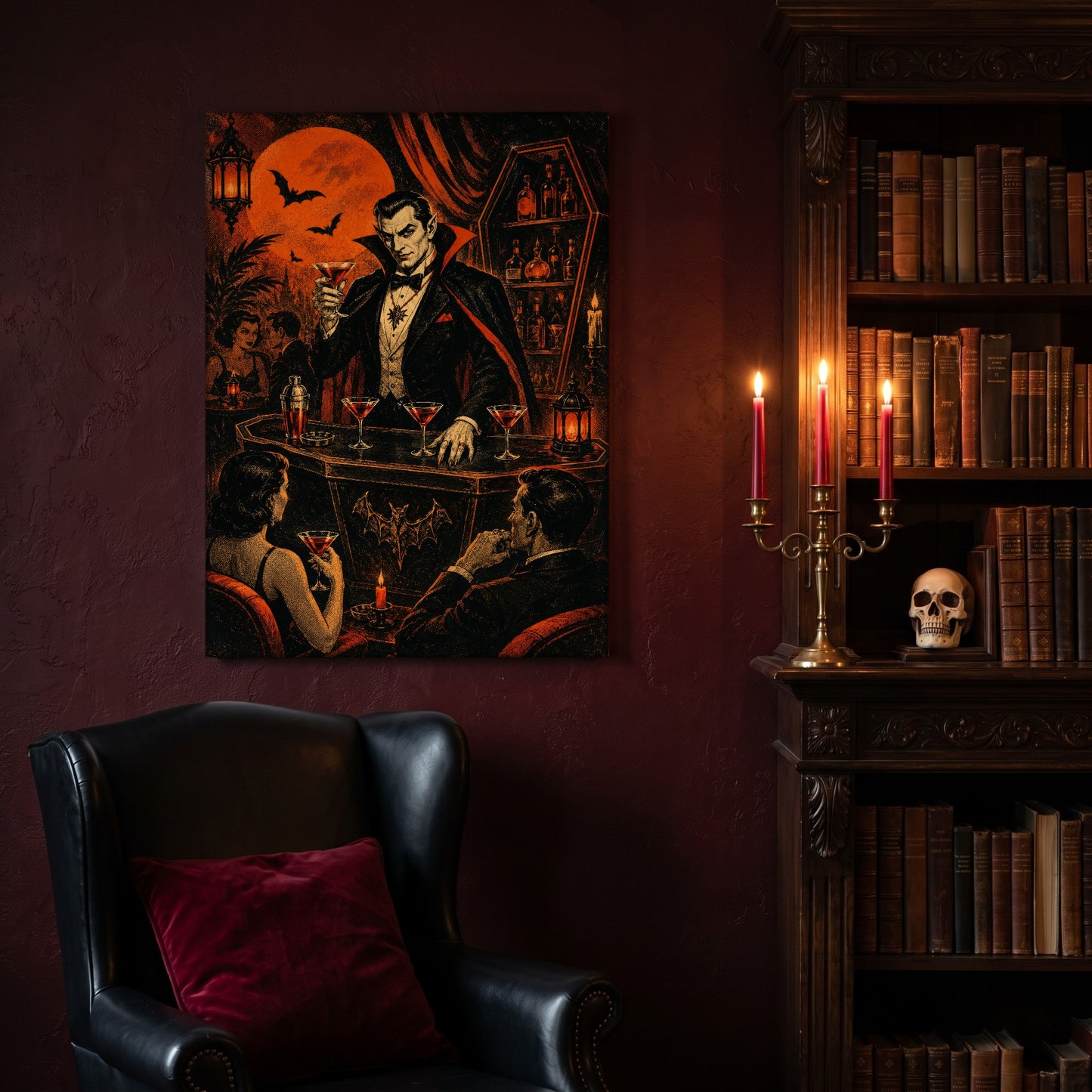 Shaken Not Staked vampire bar canvas hanging on a deep oxblood wall in a reading nook, above a black leather wingback chair with a red velvet cushion, beside a carved bookcase of antique books, a brass candelabra of lit red tapers and a human skull on the shelf.
