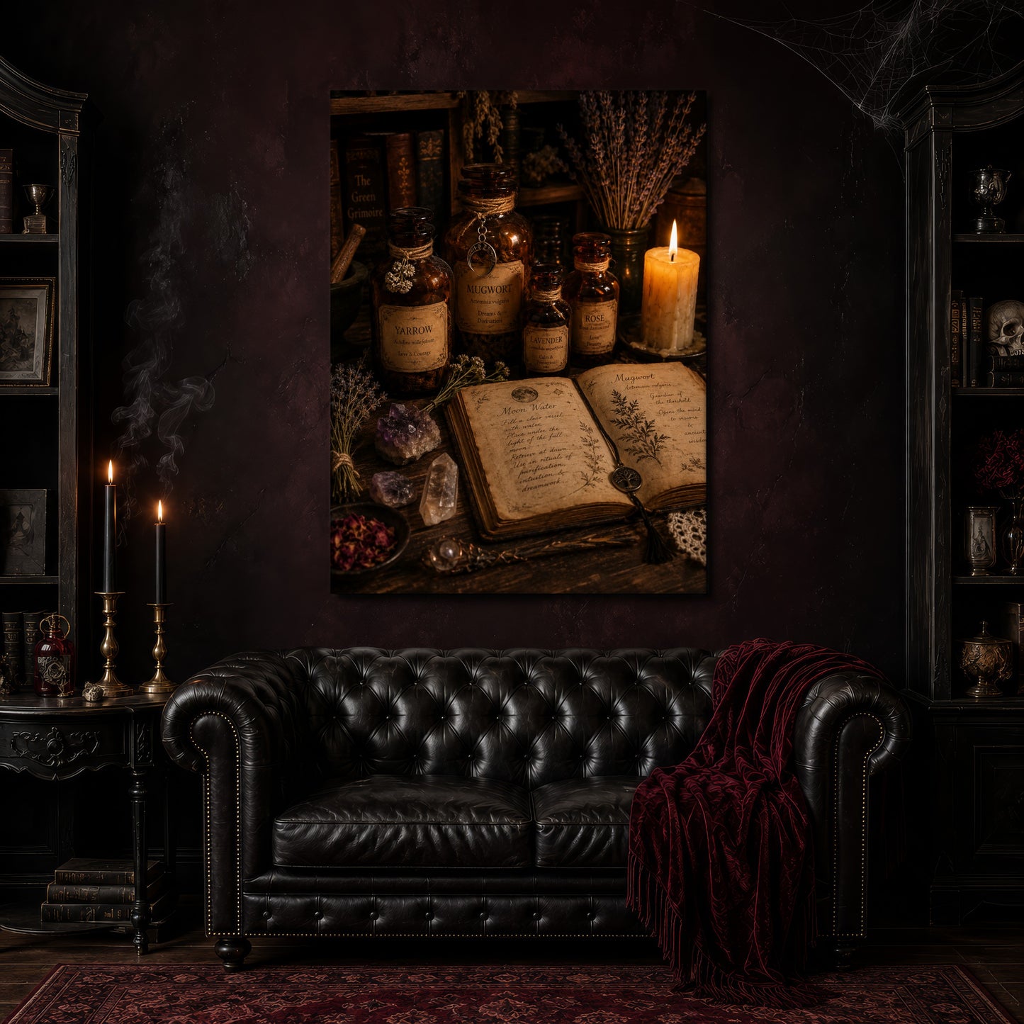 The Still Room herbal canvas hanging above a black tufted Chesterfield sofa draped with a red fringed velvet throw, in a cobwebbed oxblood parlour with brass candlesticks, dark cabinets of books and goblets, and a patterned red rug.