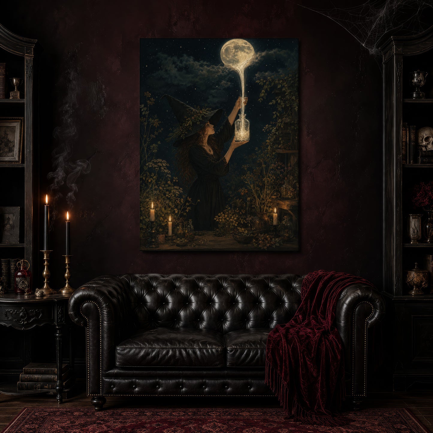 Moonfall canvas hanging above a black tufted Chesterfield sofa draped with a red fringed velvet throw, in a cobwebbed oxblood parlour with brass candlesticks, dark cabinets of books and goblets, and a patterned red rug.