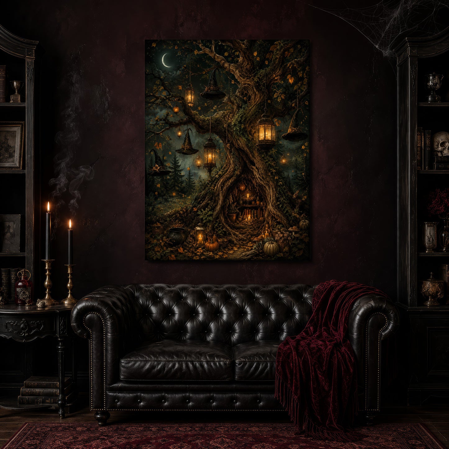 Ember Hollow canvas hanging above a black tufted Chesterfield sofa draped with a red fringed velvet throw, in a cobwebbed oxblood parlour with brass candlesticks, dark cabinets of books and goblets, and a patterned red rug.